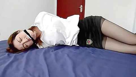 Asian Woman Taped Up