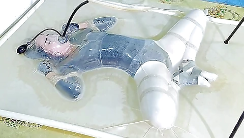 Frogtied In Transparent Vacbed
