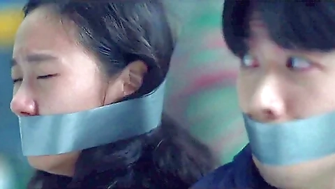Korean Woman And Man Wraparound Tape Gagged